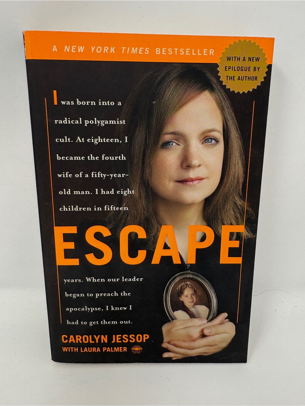 Escape by Carolyn Jessop — Paperback Memoir in Orange and Black